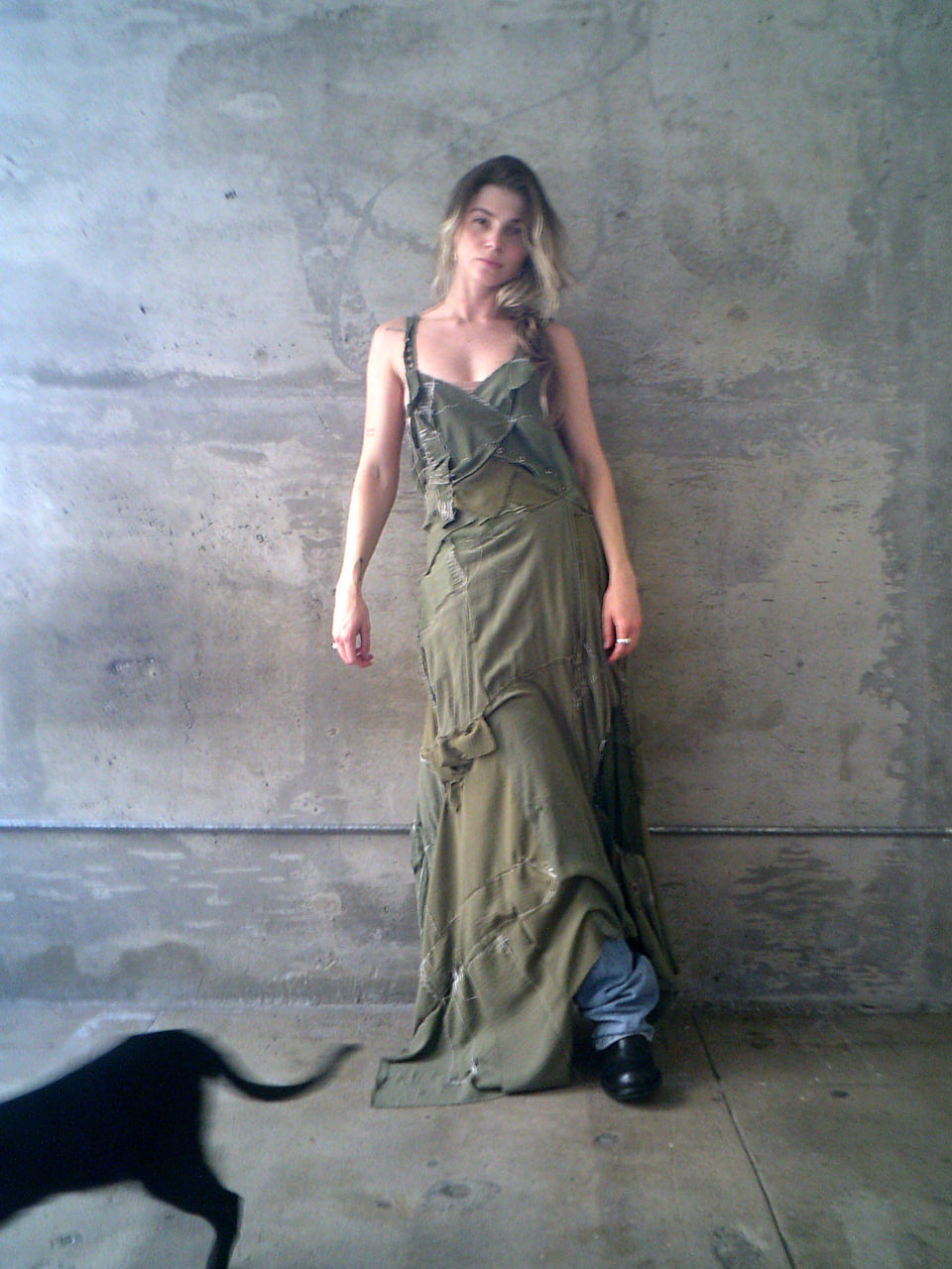 Woman in a long green handcrafted dress